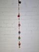 String Of Bright Painted Bells - 100 cm